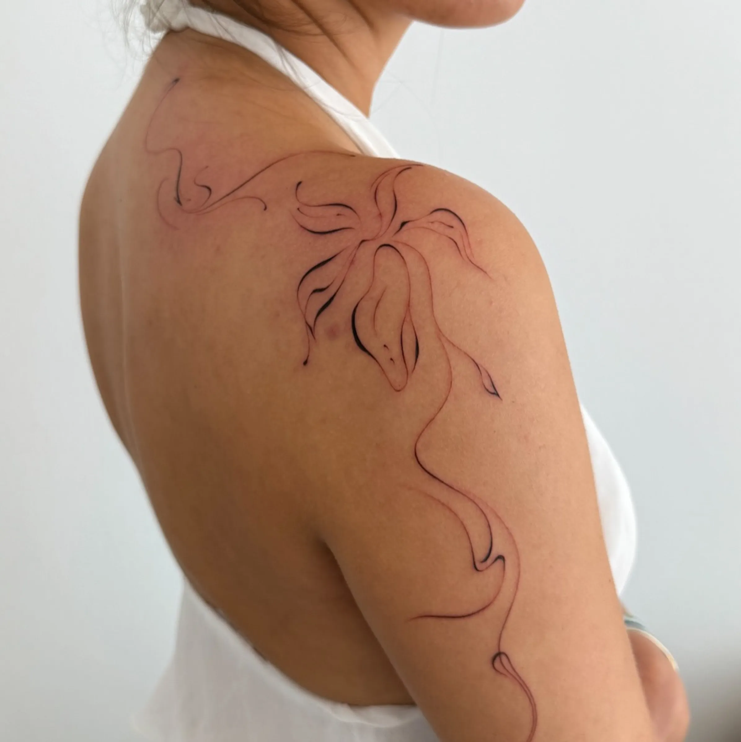 fine line tattoo touch up